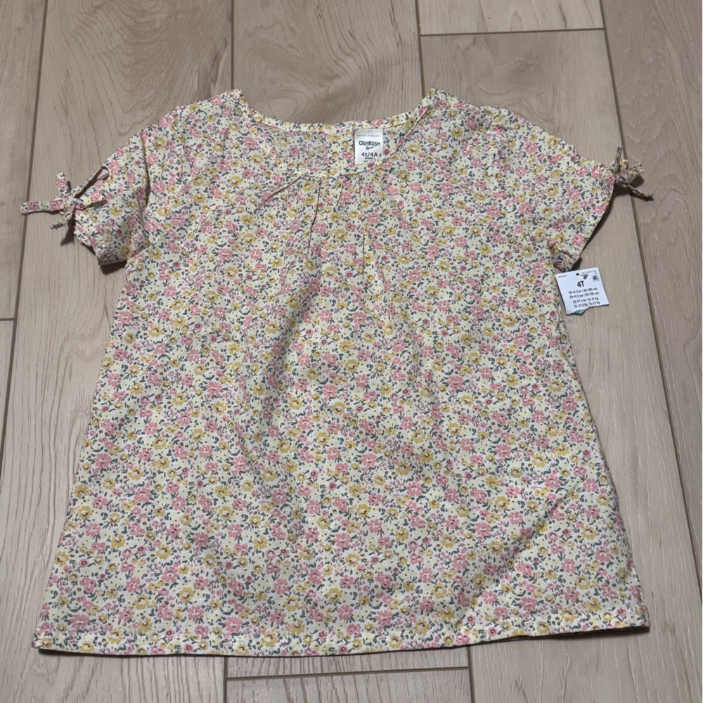 Oshkosh floral top with bow detail on sleeves